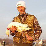 The apple doesn't fall far from the tree. This is the son of our guide Curt Schrader’s showing dad that he is not the only one with luck by shooting this red neck collared snow goose.