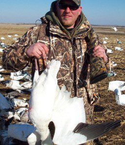 Lucky hunter with a banded snow goose.