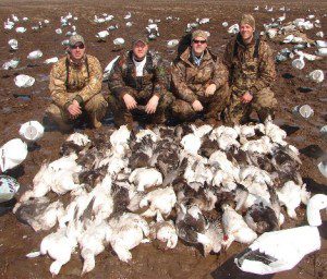 A muddy but successful early March Missouri snow goose hunt.