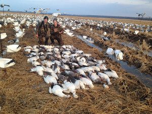 Great Arkansas snow goose hunt. Although this field looks wet the mud in Arkansas is nothing compared to the Missouri gumbo.