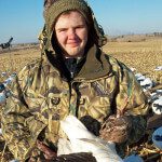 Young hunter with a banded snow goose.