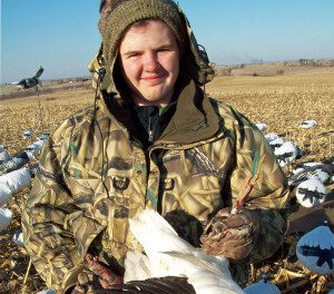 Young hunter with a banded snow goose.