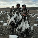 Here Up North Outdoors Guide Jim Weston (left) poses for a picture with one of his snow goose hunters.